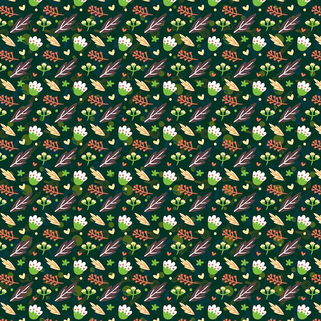 a pattern with flowers and leaves on a green background