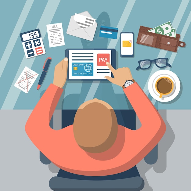pay bills online. online payment on internet concept. flat design style vector illustration. credit card, digital tablet, bill.  man at desk with a tablet.