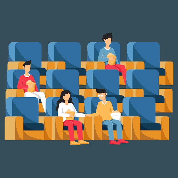 映画館や映画館の講堂で椅子に座っている人