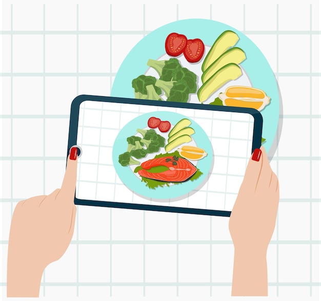 people take pictures of their food with their smartphone. a woman shoots lunch on camera.
