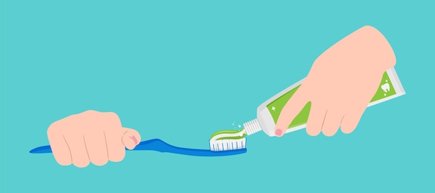 A person holding a toothbrush with a toothpaste on it.
