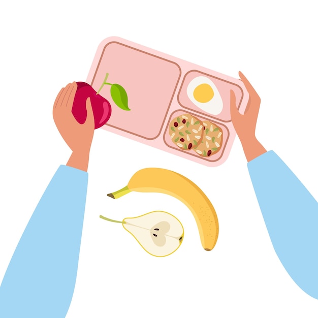 Person putting snacks in lunchbox Lanchbox with coookies egg Human hand holding apple Fruit