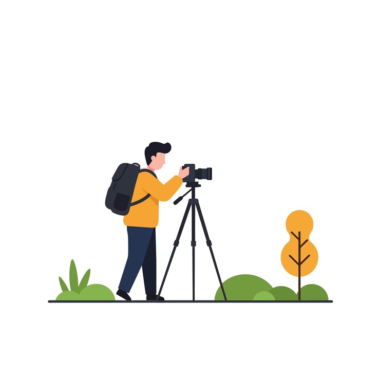 Photographer with backpack using camera on tripod in outdoor natural setting