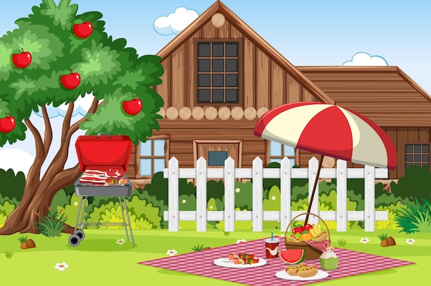 Picnic scene with food on the table and bbq grill in the garden