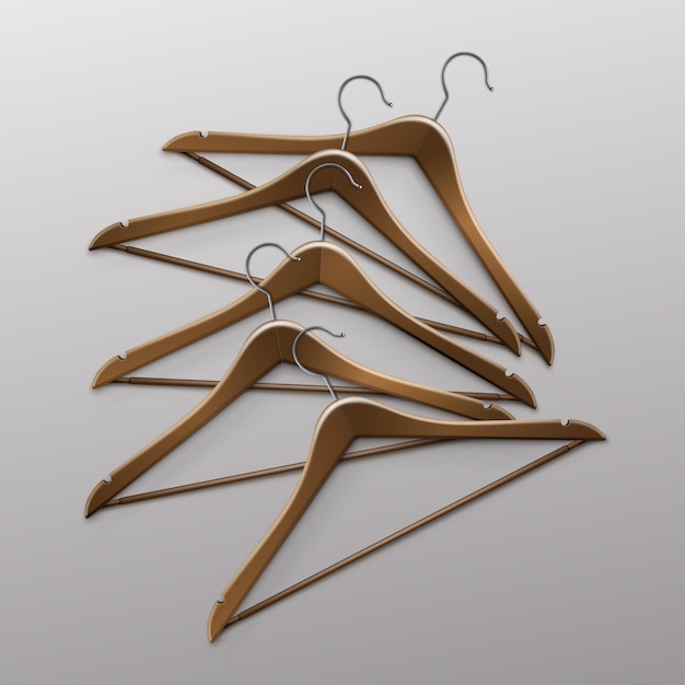 Vector pile of lying clothes coat brown wooden hangers