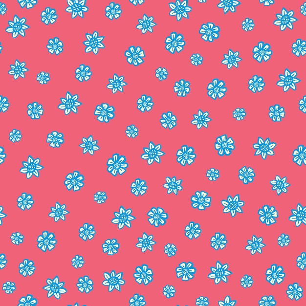 A pink background with blue flowers on it