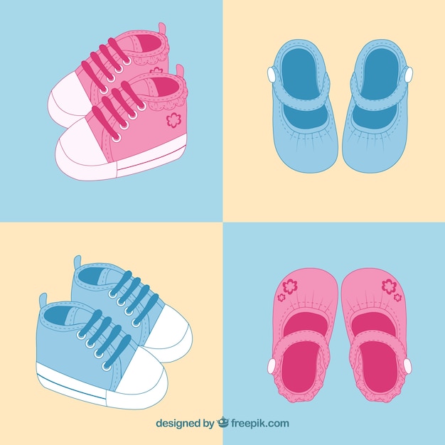 Vector pink and blue baby shoes