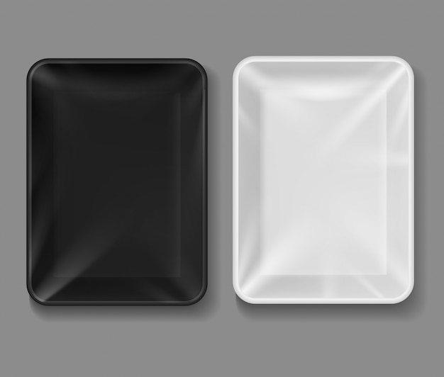 プラスチック製トレー。透明なラップ付き食品パッケージ、野菜、肉用の黒と白の空のコンテナー。真空ボックスのモックアップ
