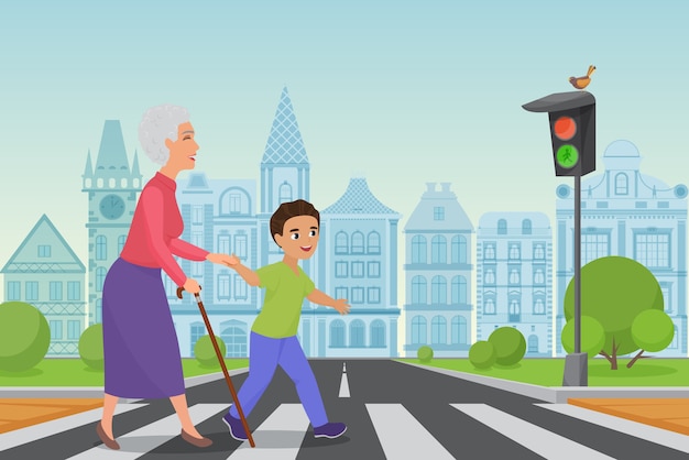 Polite little boy helps smiling old woman to pass the road at a pedestrian crossing while the green light shines.