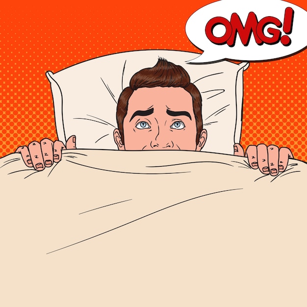 ベッドに隠れているポップアートショックを受けた男。怖い男は毛布の下でのぞきます。