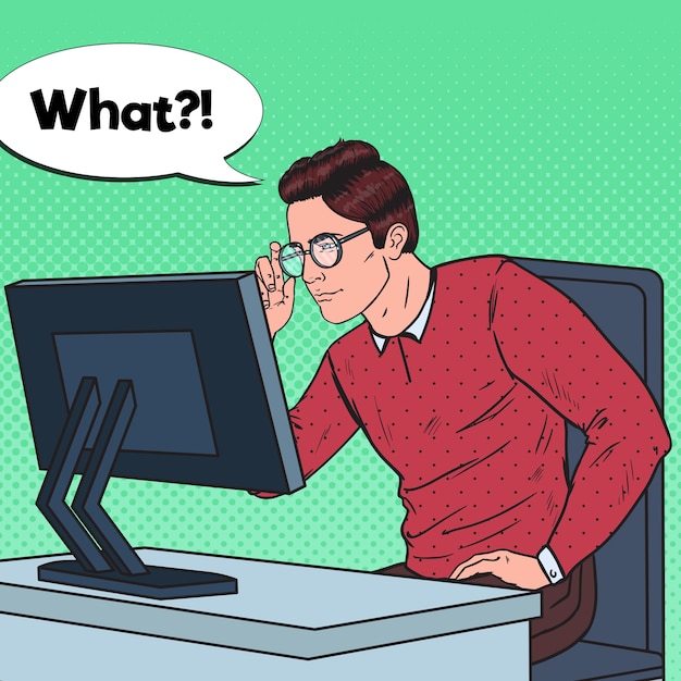 コンピューターで働く眼鏡のポップアートの目の弱い若い男