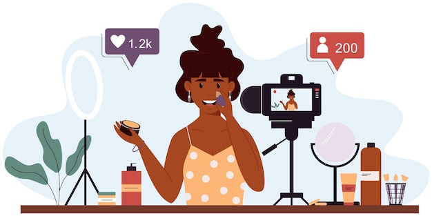 popular woman video blogger records a video review of cosmetics using a video camera