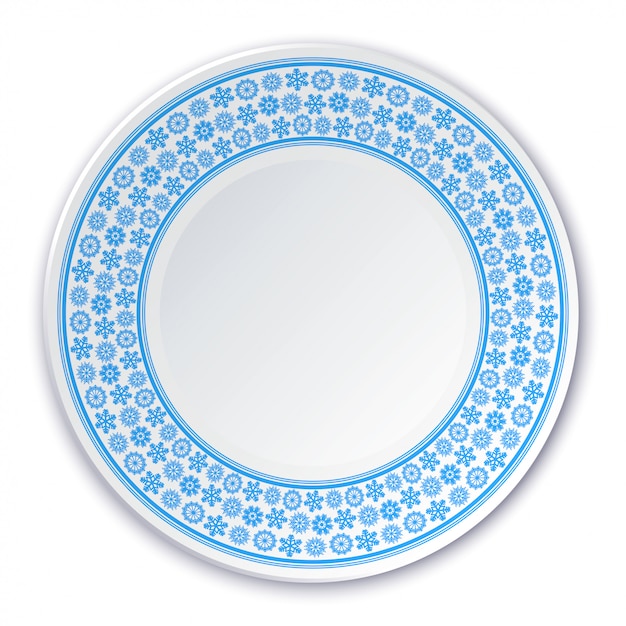 Porcelain plate on a painting of a blue snowflakes on a white background