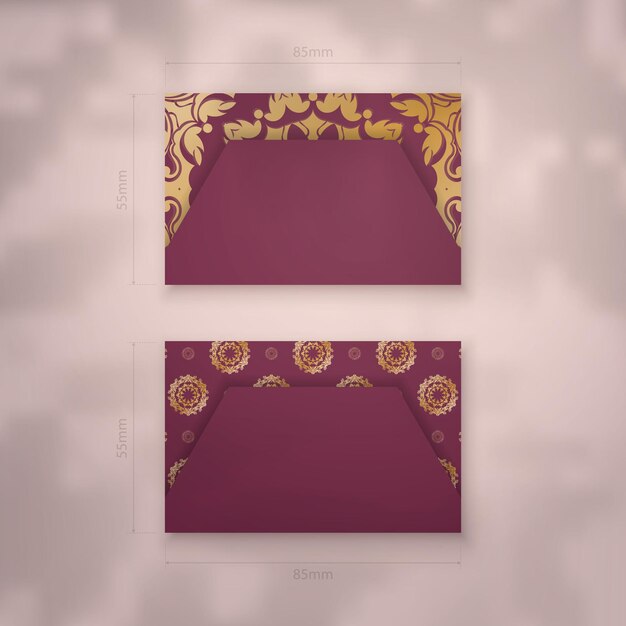 Presentable burgundy business card with gold mandala ornament for your contacts.