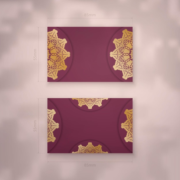 Presentable burgundy business card with Greek gold pattern for your personality.