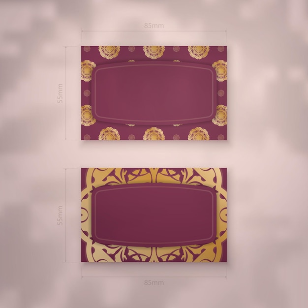 Presentable business card in burgundy color with Greek gold ornaments for your business.