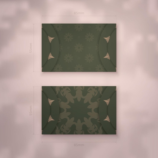 Presentable business card in green color with luxurious brown ornament for your business.