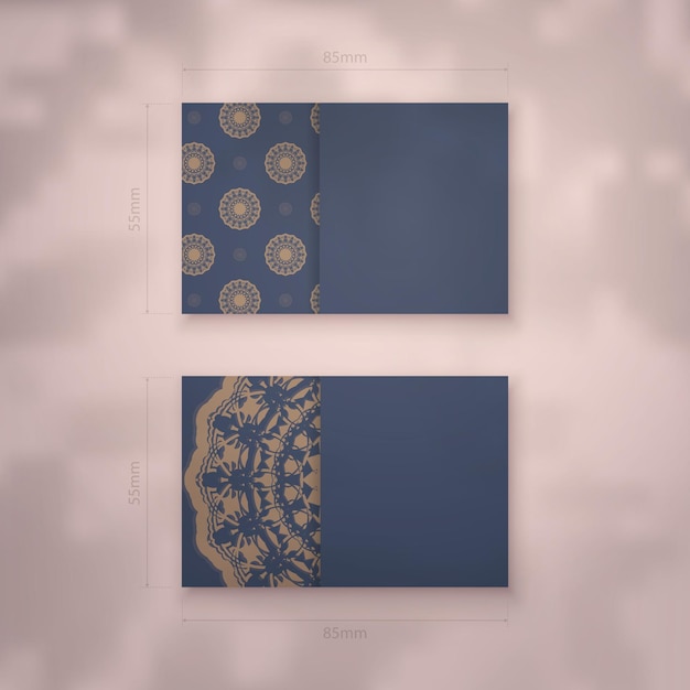 Presenteerbaar visitekaartje in blauw met vintage bruine ornamenten voor uw merk.