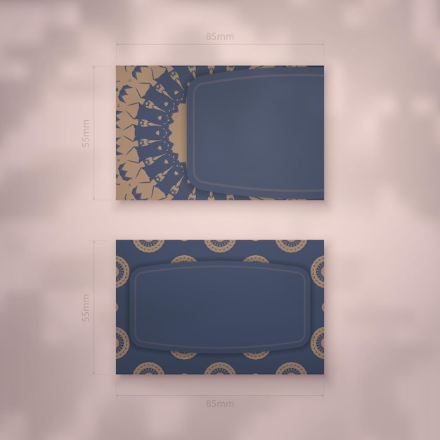 Presenteerbaar visitekaartje in blauw met vintage bruine ornamenten voor uw persoonlijkheid.