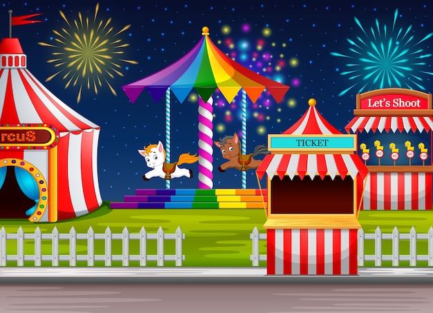 Pretpark scene met circustent en vuurwerk