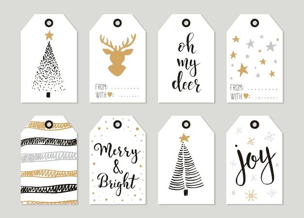 Prettige kerstdagen en gelukkig nieuwjaar vintage cadeau-tags en kaarten met kalligrafie. handgeschreven letters. hand getrokken ontwerpelementen. afdrukbare items