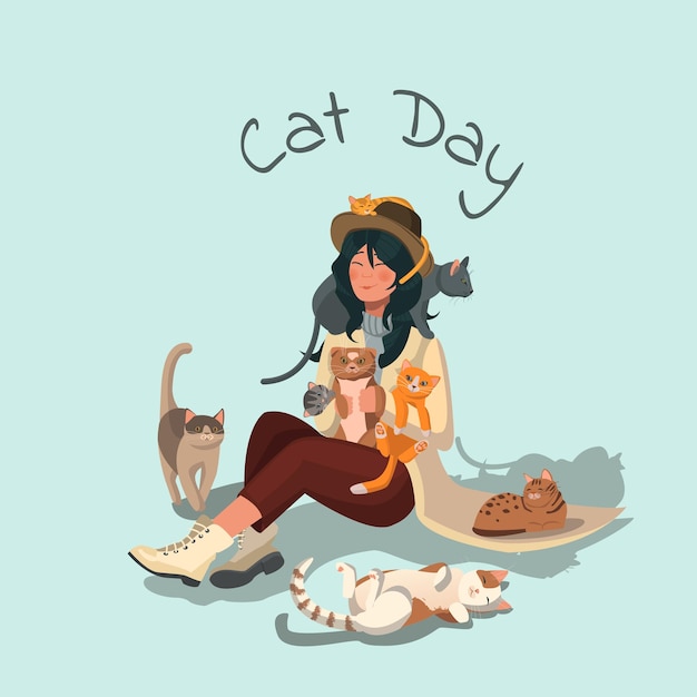 Pretty young girl and her cats isolated on blue background. Portrait of adorable pet owner and cute