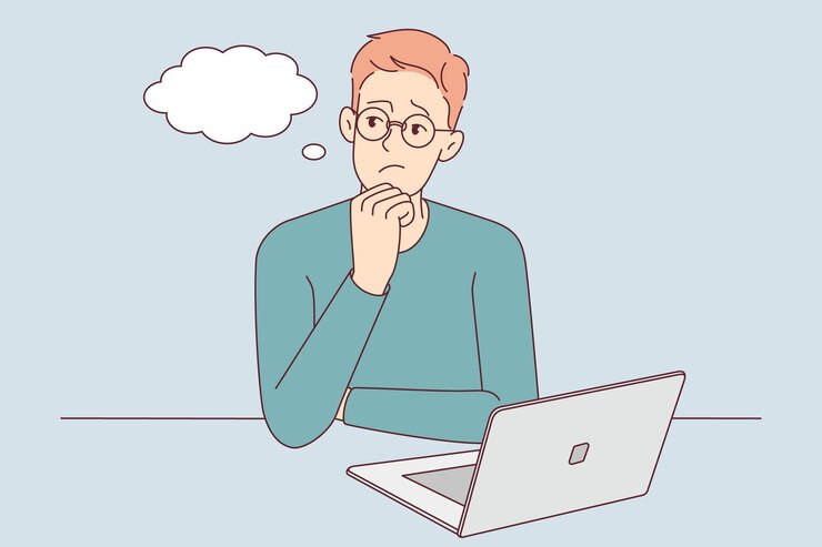 Vector the programmer sits at a laptop and thinks