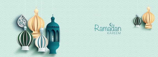 Ramadan kareem banner design with origami paper arabic lamps hang on light blue islamic pattern background