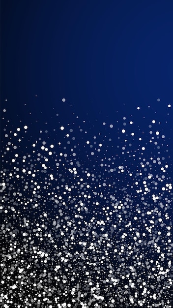 Random white dots christmas background. subtle flying snow flakes and stars on dark blue background. amusing winter silver snowflake overlay template. delightful vertical illustration.