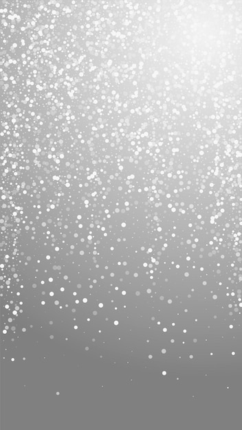 Random white dots Christmas background. Subtle flying snow flakes and stars on grey background. Amazing winter silver snowflake overlay template. Fancy vertical illustration.