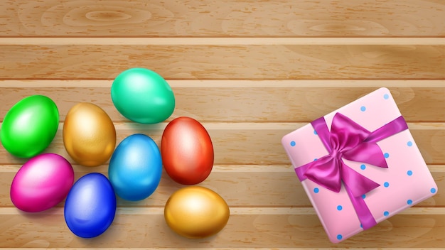 Realistic colored Easter eggs tasty cake and beautiful gift box with bow on wooden planks