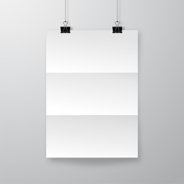 Realistic crumpled paper sheet with shadow. wrinkled poster hanging on bulldog clips   template.