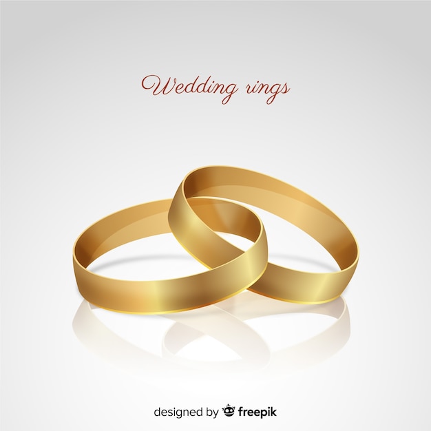 Realistic golden wedding rings background