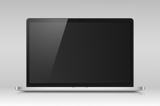 黒い画面と灰色のグラデーションの背景に反射した現実的なラップトップのレイアウト