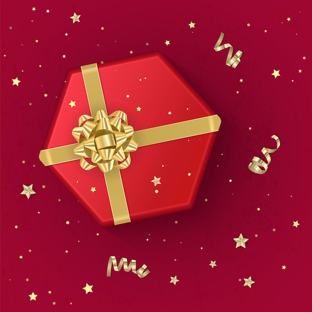 Реалистичная подарочная коробка красного цвета, украшенная золотым бантом, вид сверху.