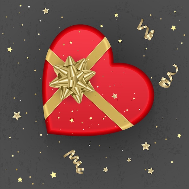 A realistic red gift box with shape of heart decorated with a gold bow, top view.
