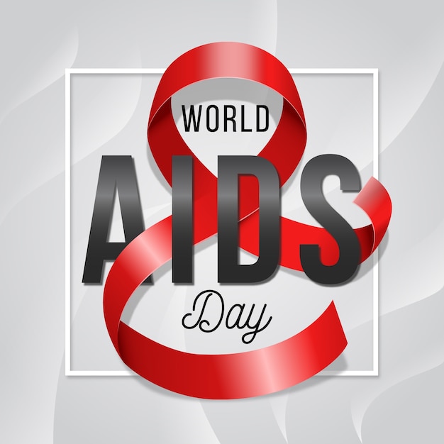Vector realistic text and world aids day ribbon