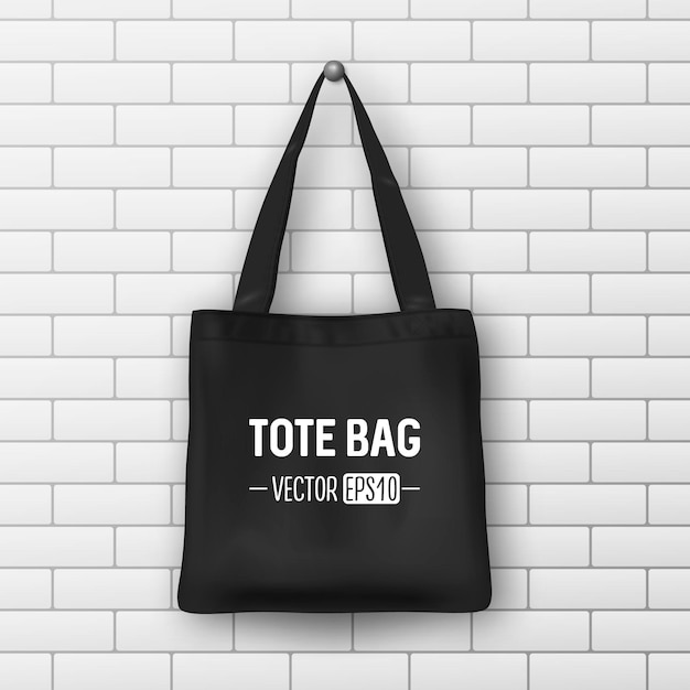 Realistic vector black textile tote bag. Closeup on brick wall background. Design template for branding, mockup. EPS10 illustration.