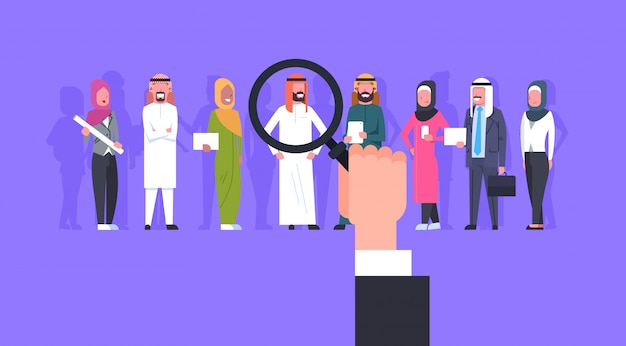 Recruitment hand zoom magnifying glass picking business person candidate from arab people group