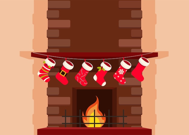 밧줄에 매달려 양말과 붉은 벽돌 벽난로. 크리스마스와 새해 겨울 방학 선물.