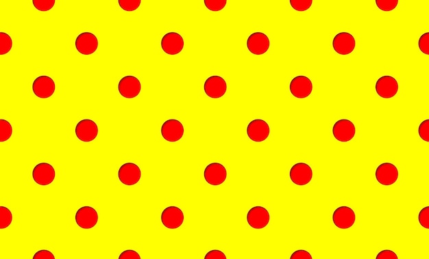 Vector red paper cut polka dot circles with yellow backdrop seamless pattern vector perforated background