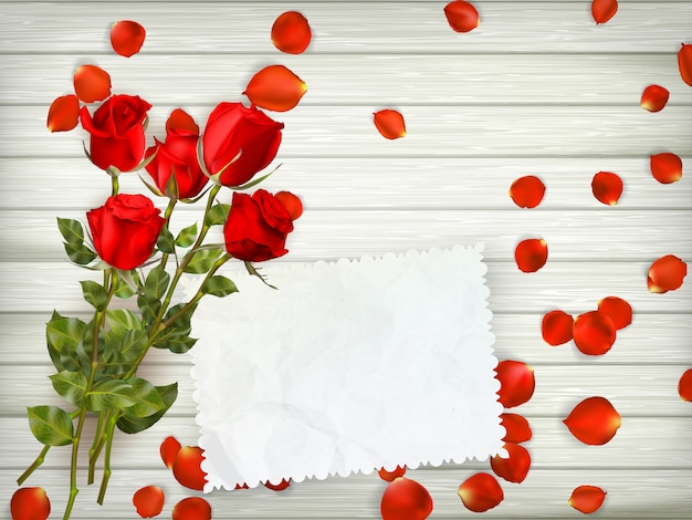 Red roses on wood background.