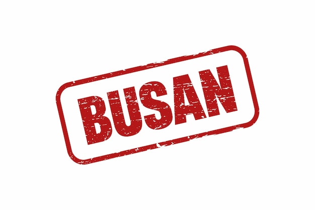 A red rubber stamp with the word busan on it