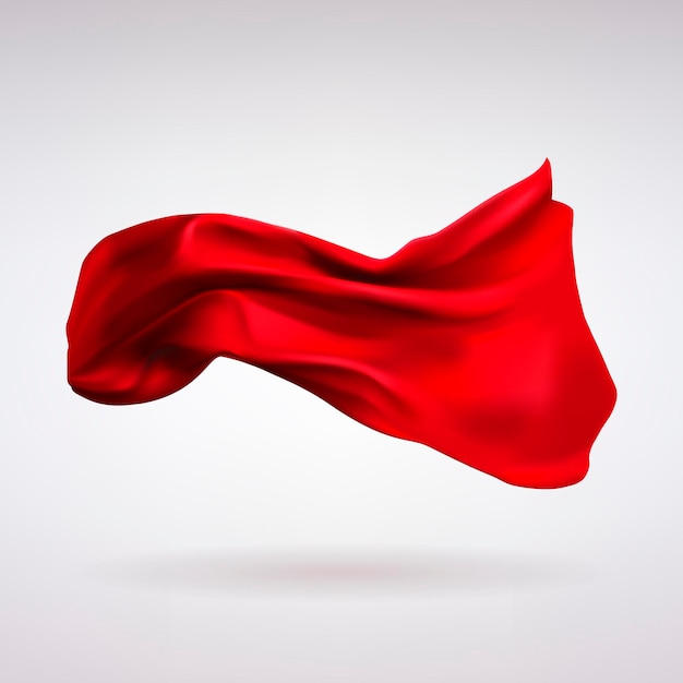 Красная атласная ткань, летящая на ветру