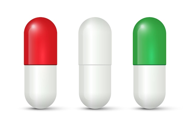 Red, white and green capsule pills isolated on white background.