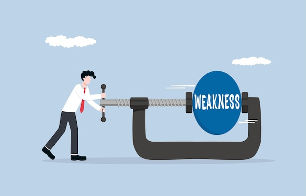 Reducing selfweakness concept Businessman using clamping to squeeze weakness ball