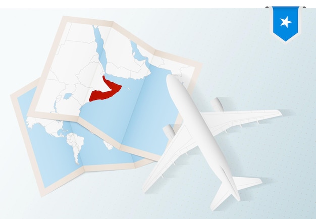 Reis naar somalië, bovenaanzicht vliegtuig met kaart en vlag van somalië.