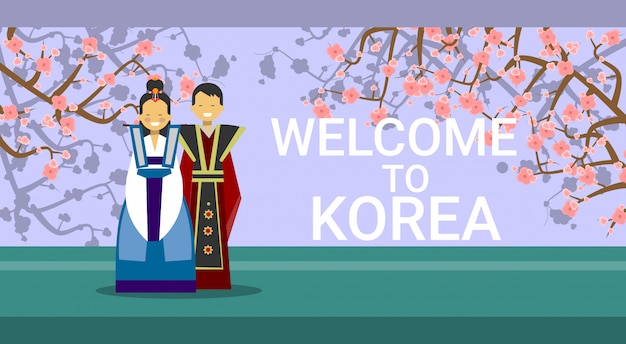 Vector reis naar zuid-korea, happy korean coupe met traditionele kostuums over sakura tree blossom