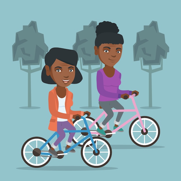 Retired african women riding bicycles in park