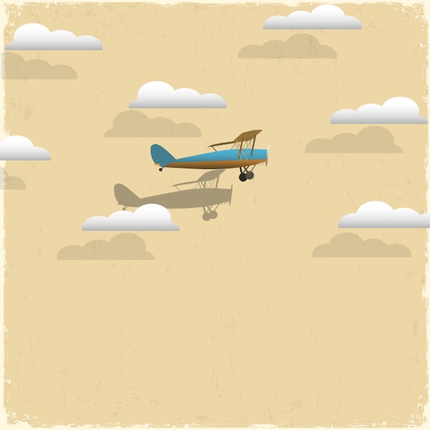 レトロな飛行機と紙から雲